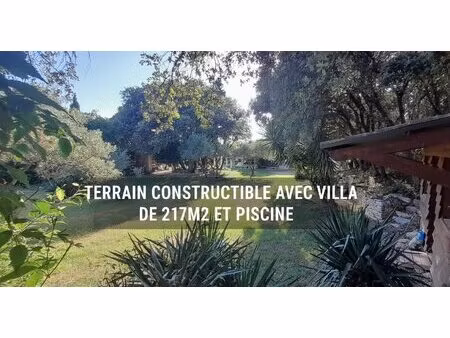 terrain constructible avec villa et piscine