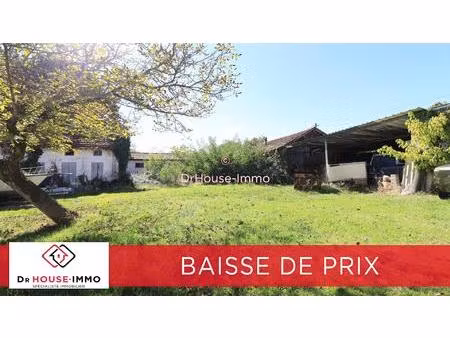 maison et grange à rénover sur une parcelle de 923 m²