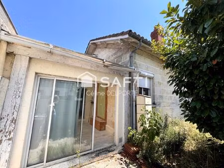 maison en pierre avec jardin à rénover