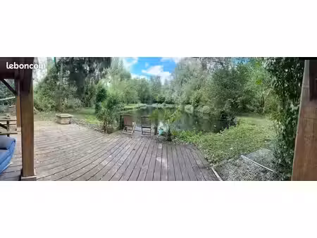 superbe terrain de loisirs de 3600m² avec étang poissonneux et cabanon aménagé