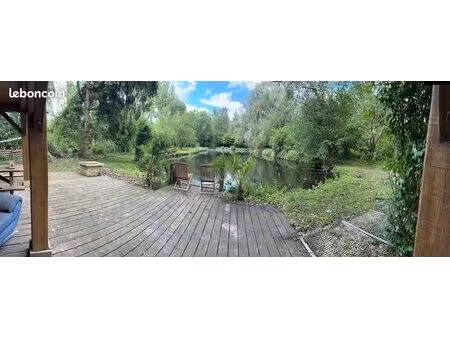 superbe terrain de loisirs de 3600m² avec étang poissonneux et cabanon aménagé
