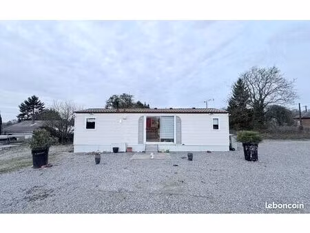 à vendre joli terrain avec mobil-home