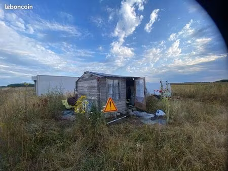 terrain clôturer 8000 m2 (box’cabane)