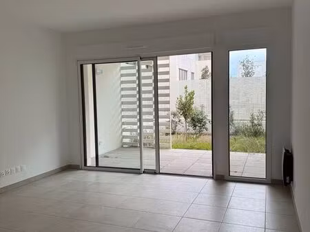 t2 avec jardin - résidence récente & moderne