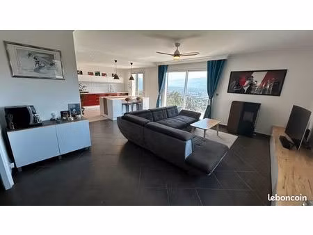 appartement d’exception de 125 m² avec terrasse de 50 m² – entrée privative – garage