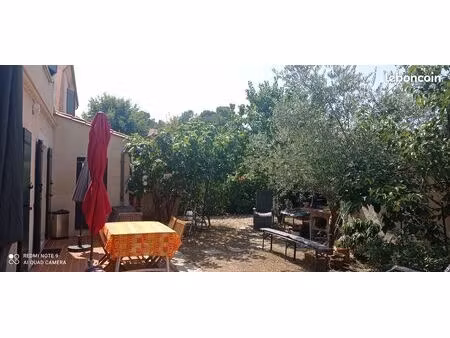 maison 6 pièces - 110 m² mitoyenne par le garage