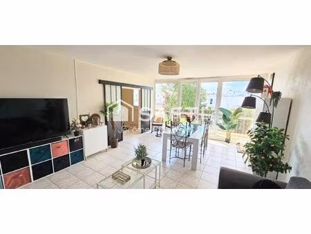 secteur gare : appartement de 98m² avec 3 chambres  balcon  cave et garage.