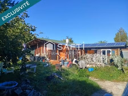 tres beau terrain avec 2 chalets