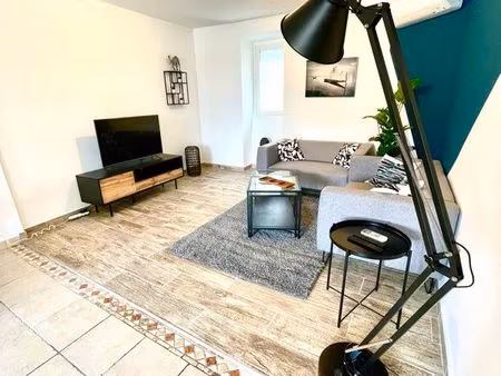 appartement 100 m² avec terrasse et jacuzzi
