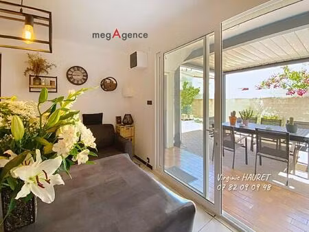 appartement 51m² en rdc - 2 chambres - 1 terrasse 50m² - 2 celliers