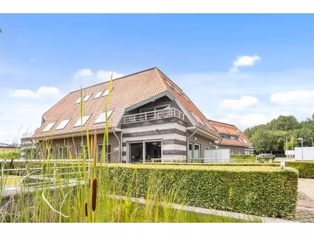 instapklaar gelijkvloers 1-slaapkamerappartement met tuin en terras in de haan