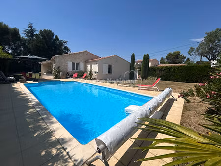 maison de plain-pied 3 chambres + annexe sur parcelle arborée de 876 m² avec piscine et ga