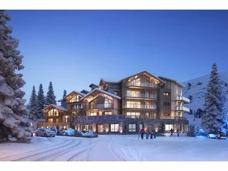 triplex penthouse exceptionnel de 5 chambres ski-in/ski-out sur le front de neige