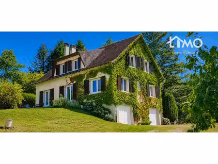 maison sur sous-sol avec double garage de 166 m² habitable sur une parcelle de terrain de.