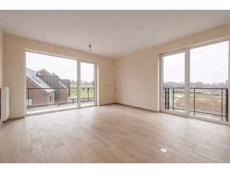 appart. 2 ch. dans immeuble neuf