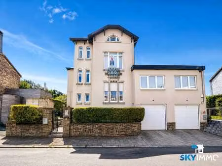 magnifique duplex 2 chambres - garage - cave - jardin