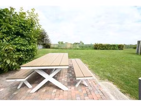 verzorgde woning met sublieme tuin met landelijk uitzicht!