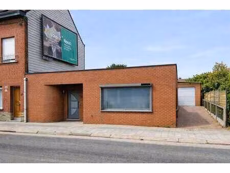 plain-pied 3 façades avec garage et double potentiel d'accès