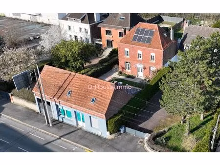 béthune centre  double propriété belle 1930 de 160m2 plus local de 140m2  très bonne situa