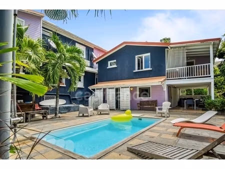 a louer - case-pilote - appartement en rdc - 3 pièces avec terrasse et piscine commune