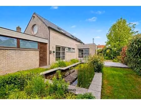 rustig gelegen open bebouwing met ruime tuin