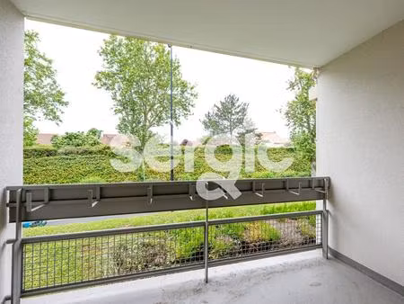 appartement 2 pièce(s) avec un balcon  une cave et un parking sécurisé
