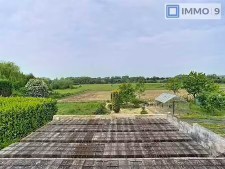 maison en gros oeuvre avec panneaux solaire