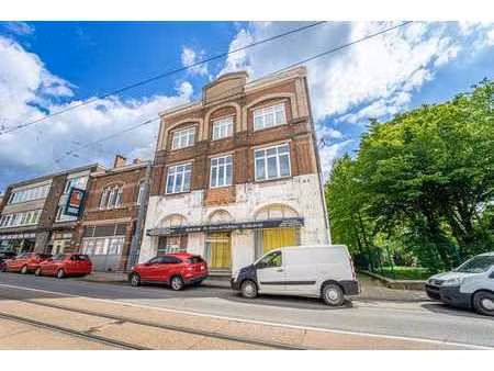 immeuble de rapport avec commerce et 3 appartements
