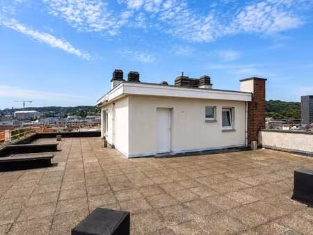 studio avec terrasse de ±100 m² et vue panoramique