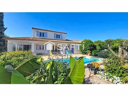maison de 153 m² avec piscine  garage  trois chambres sur une parcelle de 1265 m²