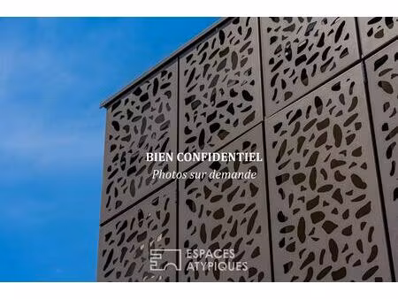 une villa-appartement où l'architecture devient une signature