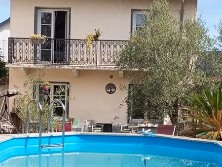 charmante maison de village avec jardin arboré piscine et double garage