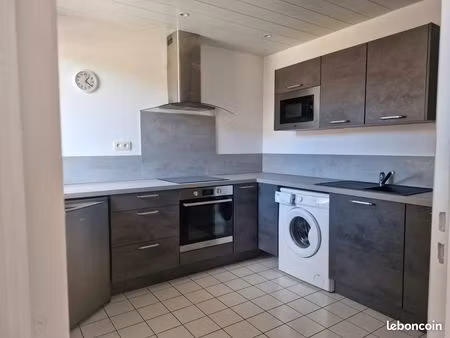studio 32 m2 avec cuisine fermée