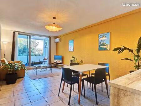 50m2 avec balcon coeur de st gilles