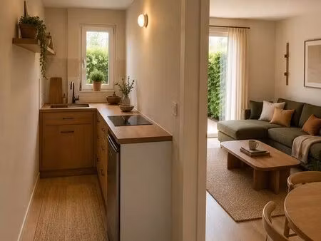t2 avec bureau de 46 m² – grand jardin  climatisation – quartier calme
