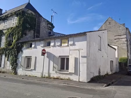immeuble avec rapport locatif - local professionnel et 2 apparte