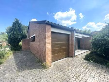 maison 4 façades de plain-pied avec jardin et garage