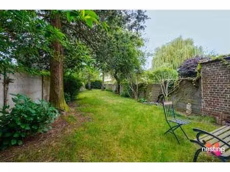 magnifique rez-de-chaussée avec grand jardin