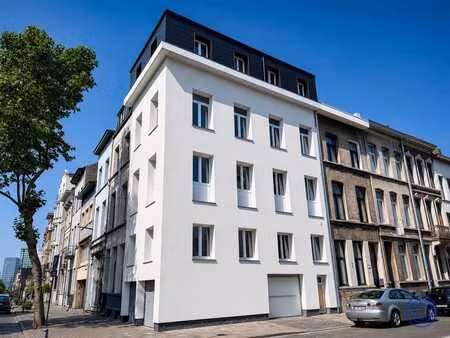 immeuble d'appartements (4 logements) avec garage  soumis à