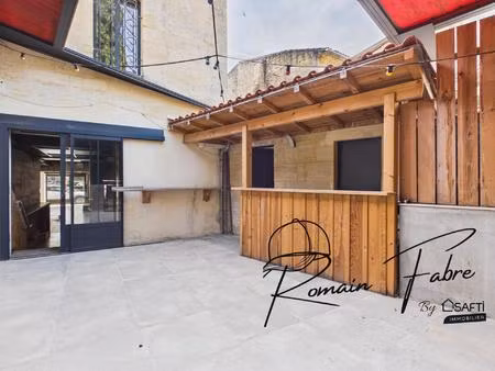 immeuble alliant local commercial et habitation de 104 m2 en plein cœur de st andré de cub