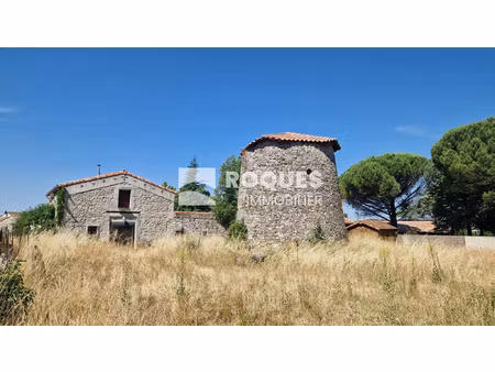 a vendre  le caylar  belle maison en pierres  cinq pièces  1