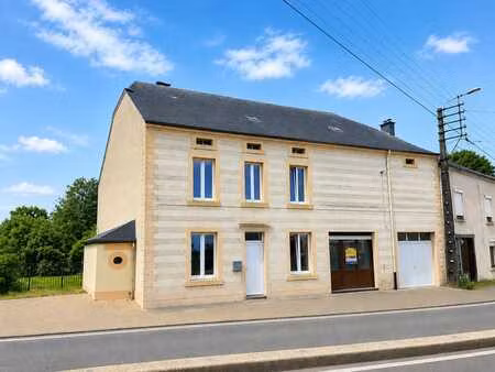 bâtisse avec jardin offrant un beau potentiel d'affectation