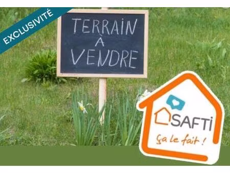 terrain de 1015m2 constructible viabilisé