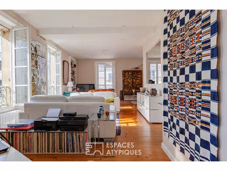 lumière  volume et prestations soignées pour cet appartement de charme
