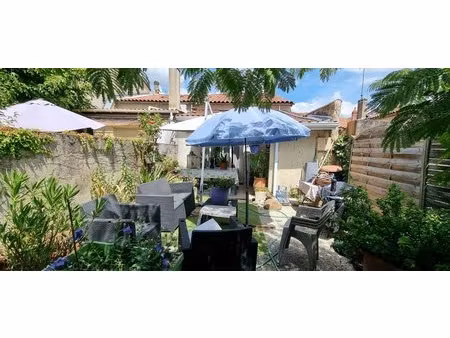 exclusivite : centre ville maison de ville plain pied sur jardin ;