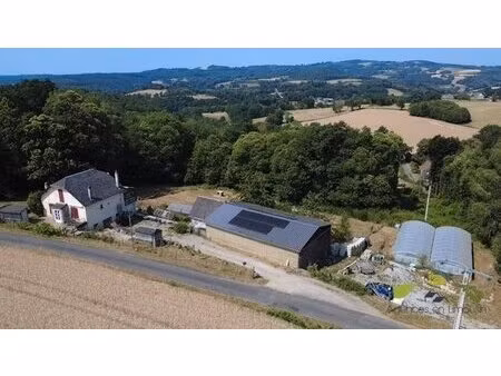 a secluded country property (the nearest neighbour is over 100 m away)  comprising a house