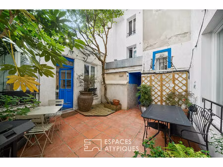 petite maison avec cour au calme absolu - marcadet-poissonnier