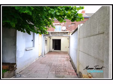 maison de ville de 110m² avec jardin à fort potentiel - spécial investisseur ou bricoleur