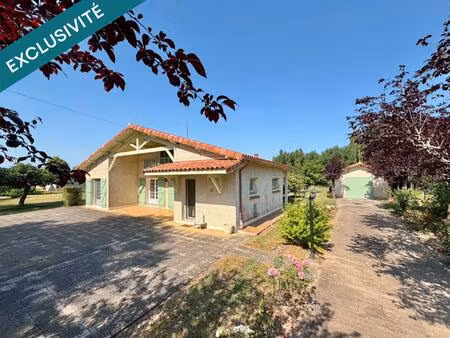 maison plain pied avec grand garage et terrain clos