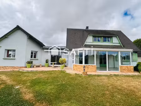 maison sur sous-sol avec double garages et garage camping car
